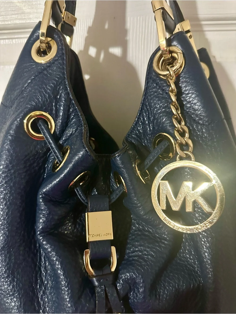 Michael Kors Navy Pebbled Leather Tassel Hobo with Gold Hardware